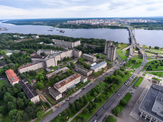 Fototapeta na wymiar CHEREPOVETS, RUSSIA-CIRCA AUG, 2017: Street of Stalevarov (steelmakers) and Oktyabrsky (October) bridge across the Sheksna river. Aerial view at city center