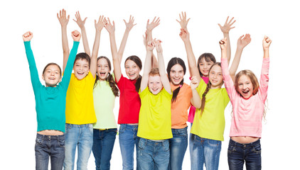 Happy children with hands up