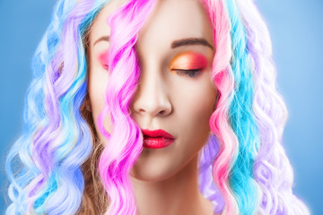 beautiful woman wearing in colorful wig