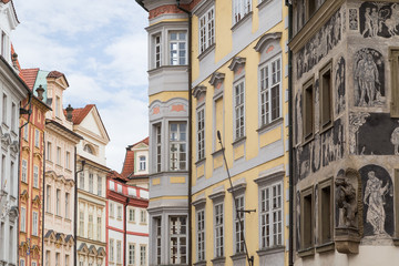 Obraz premium Old, colorful and ornate buildings next to the Old Town Square at the Old Town in Prague, Czech Republic.