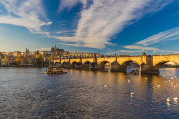 Naklejka premium Beautiful Prague castle and Charles Bridge in autumn, Prague, Czech Republic, Europe
