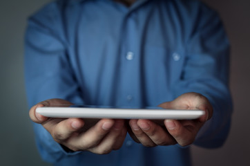 Man holding tablet