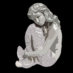 Statue of Mermaid girl with tail on black background.