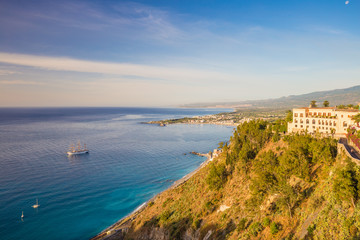Fototapeta na wymiar Panoramic sea view from Taormina main square Piazza 9 Aprile, overlooking Giardini Naxos bay, Taormina, Sicily, Italy