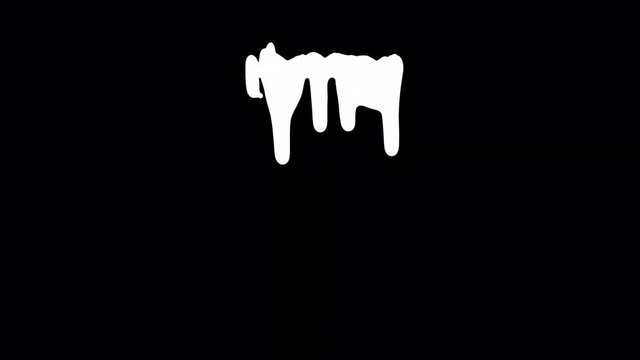 White ink dripping over black screen background. Close-up shot