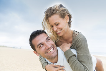 portrait of living young couple at the beach