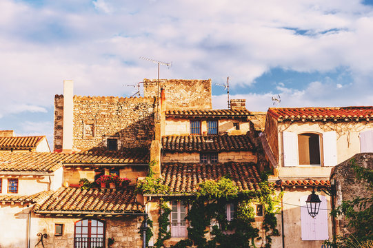 Fototapeta Old buildings in Provence at sunset, image taken in Arles, France