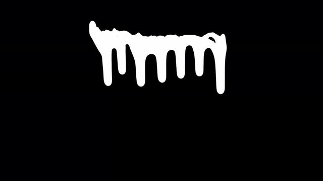White ink dripping over black screen background. Close-up shot