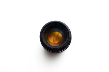 close-up view  of a camera lens on a white background