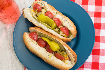Chciago Style Hot Dogs On Blue Plate With Soda Pop