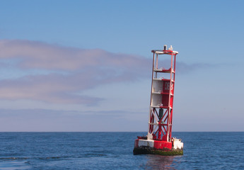 Red and White Buoy In Calm Water - Powered by Adobe