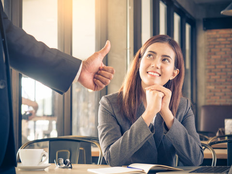 Boss/employer Admires To Young Asian Businesswoman/staff/employee With Smiling Face For Her Success And Good/best In Work.