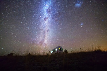 Night sky with milky way over campervan, South island New Zealand