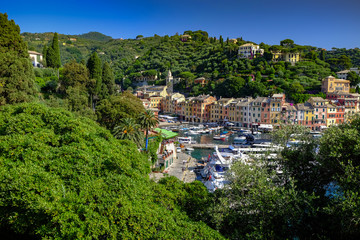 Fototapeta na wymiar Portofino harbour and surrounding hills - mid-morning