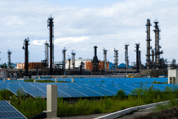 industrial buildings and solar panels. renewable energy concept.