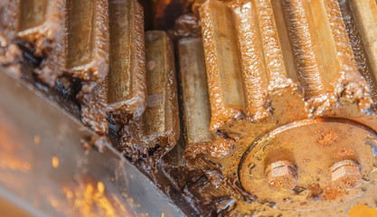 Close-up gear of machine in industry energy oil and gas in sea offshore .