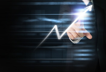 hand with stock financial chart symbols coming from hand