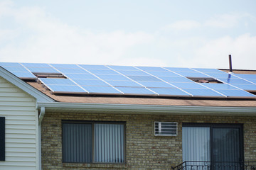 Fototapeta premium solar panel installed on the house roof