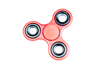 Red fidget spinner isolated on white