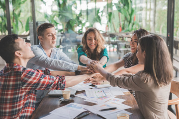 creative business teamwork put hands together