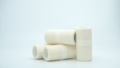 Medical cohesive elastic bandage isolated on white background with copy space