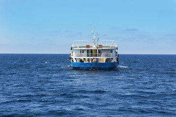 Cargo ship passes the strait