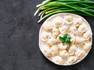 Russian pelmeni, ravioli, dumplings with meat