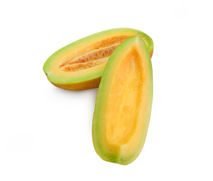 Cantaloupe melon cut in half looking healthy and delicious, isolated on white.