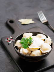 Russian pelmeni, ravioli, dumplings with meat