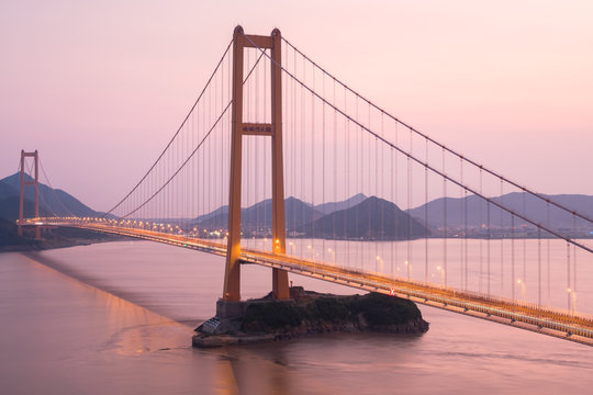 Fototapeta zhoushan xihoumen bridge in sunset