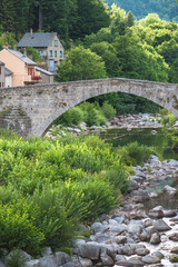 Fototapeta na wymiar Beautiful village in Ardeche, Le Pont-de-Montvert, in France, bridge 