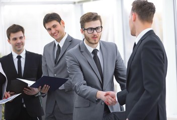 Fototapeta premium welcome and handshake of business partners on the briefing