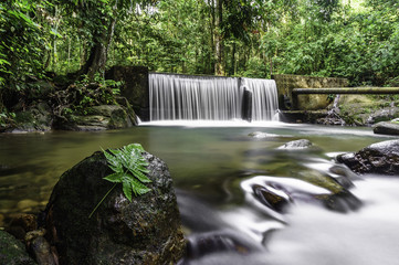 Cascades of waterfall over rock ledges