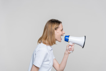 woman screaming into megaphone