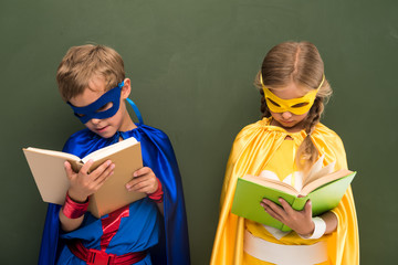 superheroes reading books