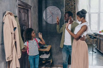 Mom and dad seeing off daughter