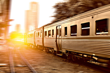 Fototapeta premium Trains running on the tracks in the evening 