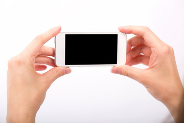 Hand and Smartphone on White Background