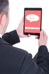 Male entrepreneur using digital touchpad for communication
