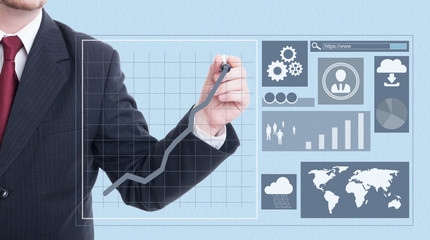 Male entrepreneur drawing with marker on screen
