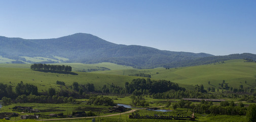 The village in the valley of the Altai Mountains