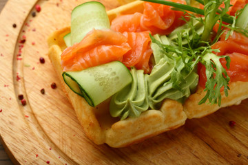 Waffle with salmon salad