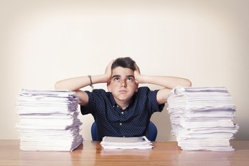 student at the desk studying, school and children