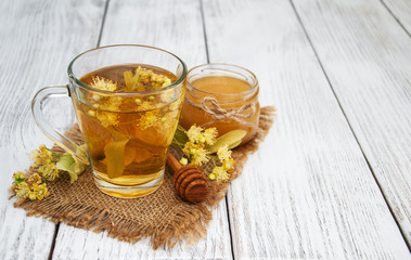 cup of herbal tea with linden flowers