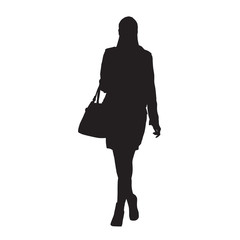 Woman walking and holding handbag or purse in her hand