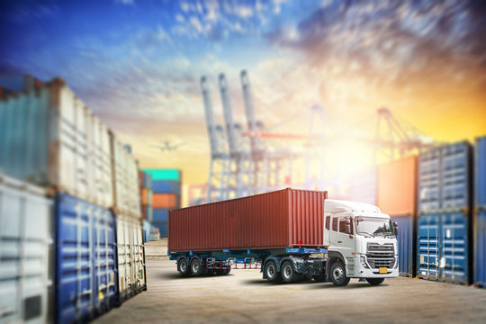 Cargo transportation unloading container trucks in warehouse logistics import export background