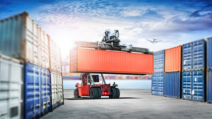 Logistics import export background and transport industry of forklift handling container box...