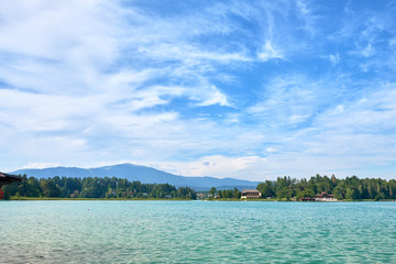 Faaker See Insel in Faaker See seen from the opposite coast in Austria