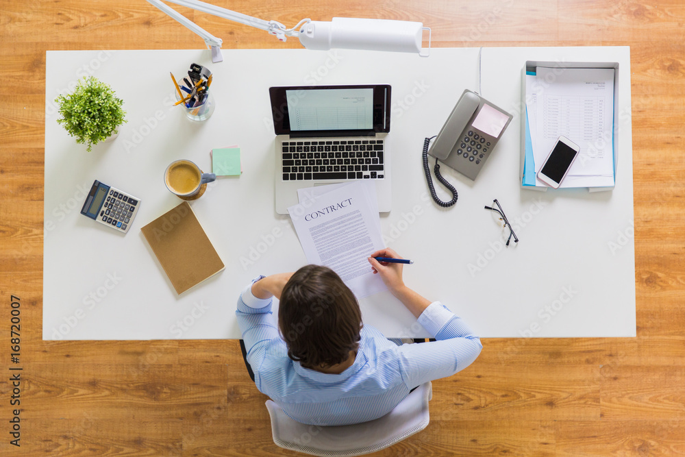 Sticker businesswoman signing contract document at office