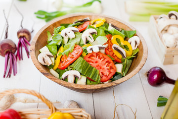 vegetable salad bowl on kitchen table, balanced diet
